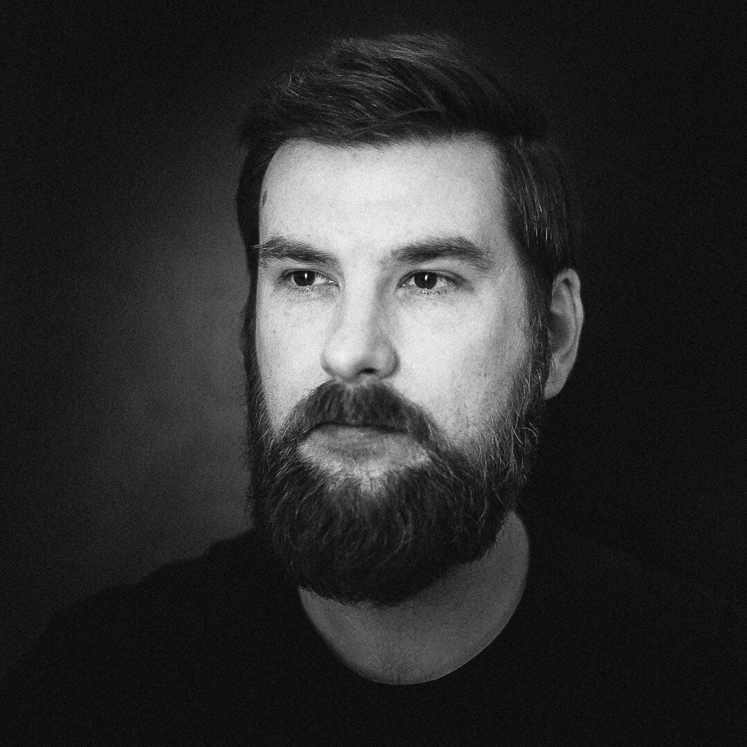 Studio portrait of a professional man video production trainer